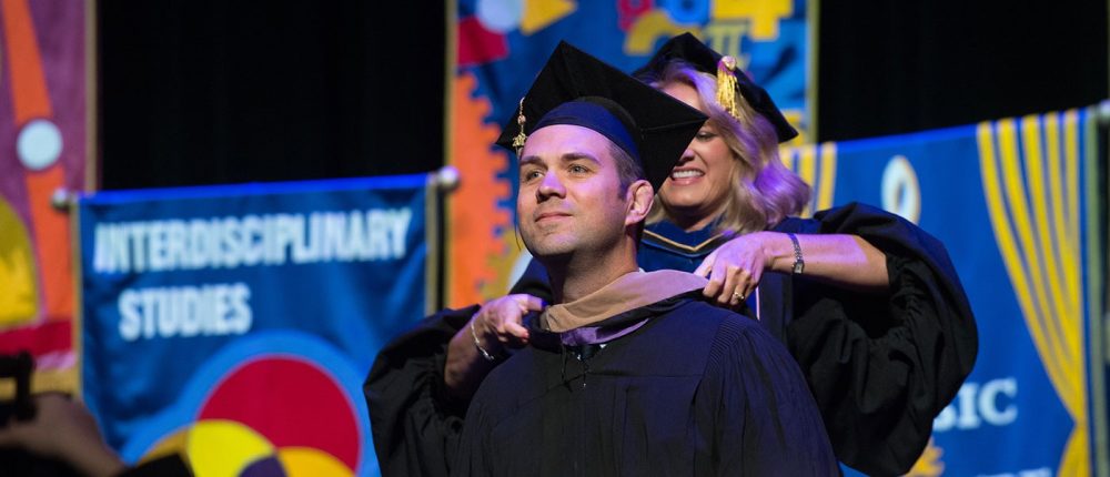 graduate at ceremony