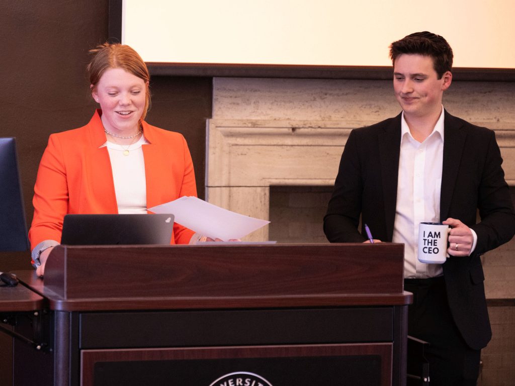 Two students presenting at a class event