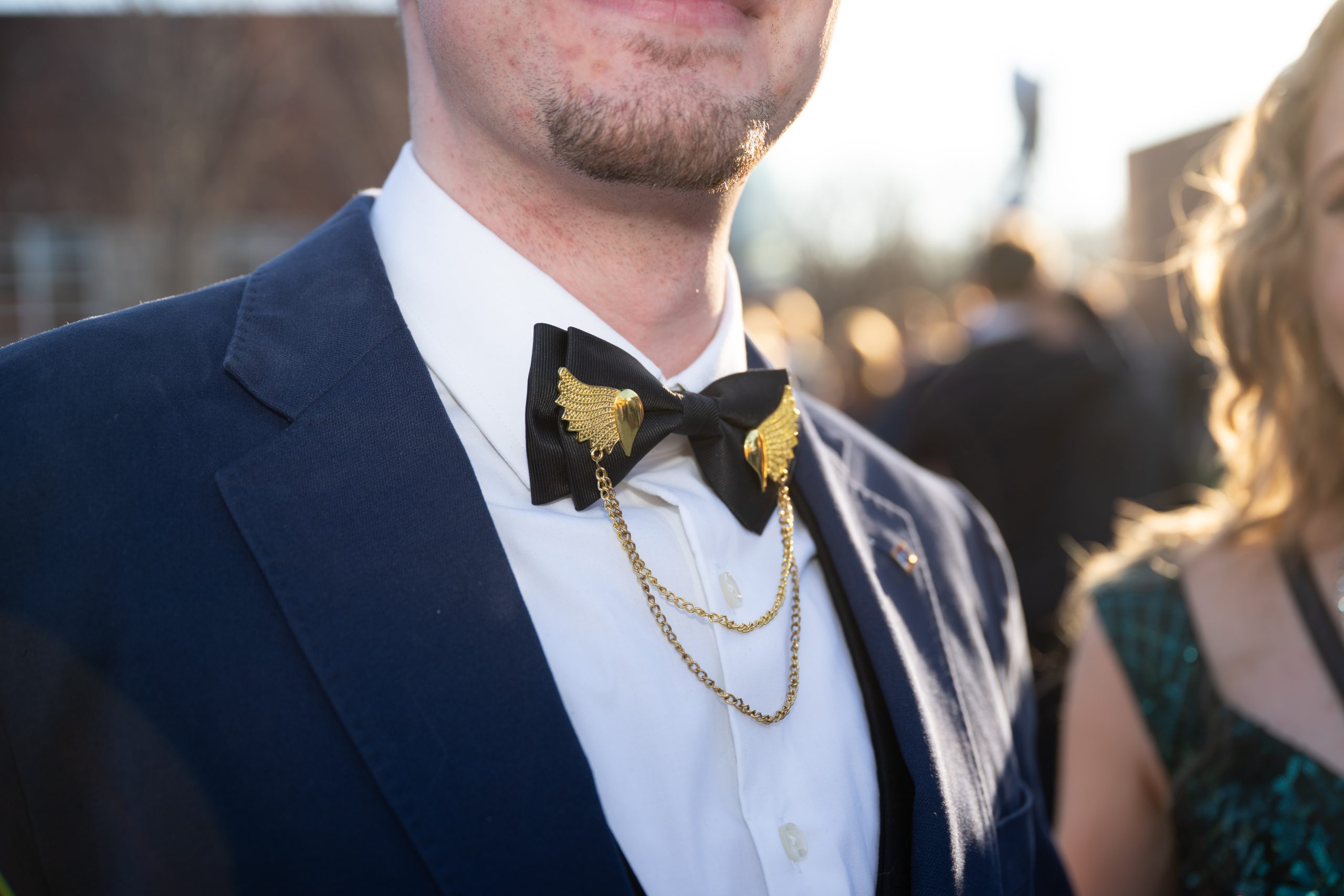 Students bowtie with chains.